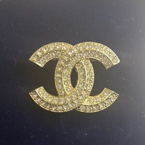 Elegant Gold and Silver Crystal Brooch